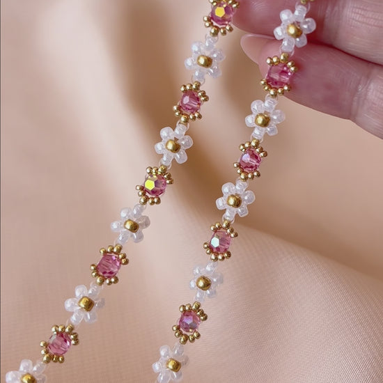 A video showcasing each colorway of the Wildflower Coquette Choker collection, highlighting the stunning sparkle of premium seed beads and Preciosa crystals.