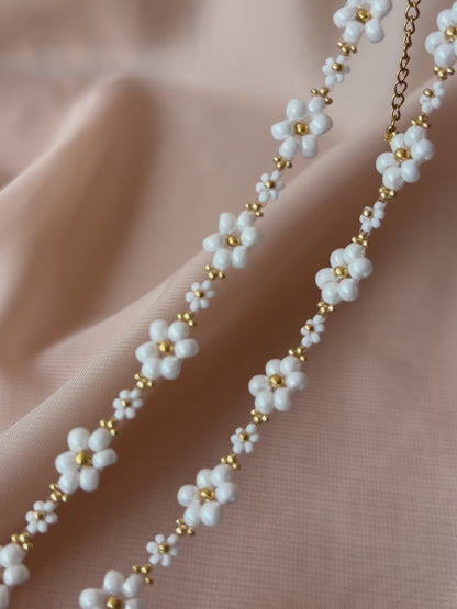 A video showcasing Dear Daisy Chokers in all available colors, highlighting the exquisite detail of premium Japanese seed bead flower designs.