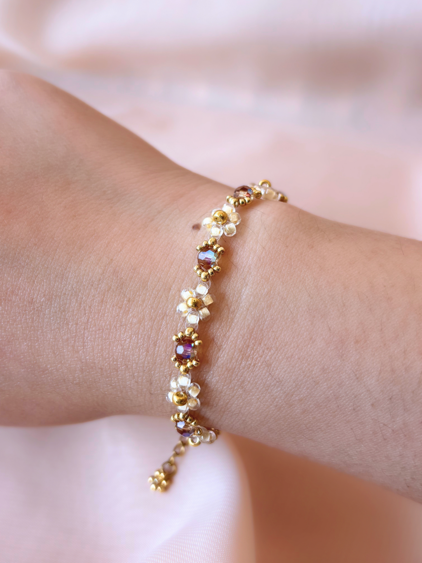 Wildflower Coquette bracelet in Gold Rush, made of premium Japanese seed bead daisies with topaz Preciosa crystal AB centers.