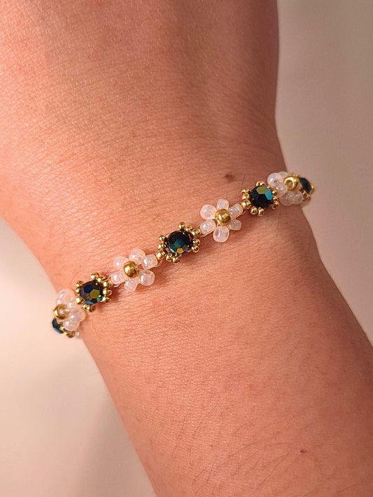 Wildflower Coquette bracelet in Midnight Rain, made of premium Japanese seed bead daisies with black Preciosa crystal AB centers.