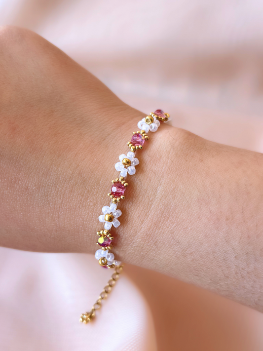 Wildflower Coquette bracelet in Pinky Promise, made of premium Japanese seed bead daisies with pink Preciosa crystal AB centers.